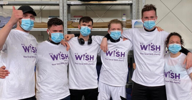 Workmates raise over £1,000 after half marathon to support stroke ward which treated one of their colleagues