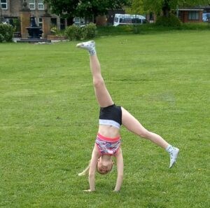 Anaiya cartwheeling for charity
